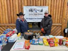 Lynne and Klaus staffing the ULWSA booth at Dubois Cowboy Christmas